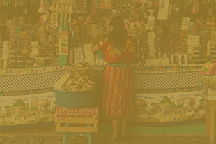 woman standing at a market